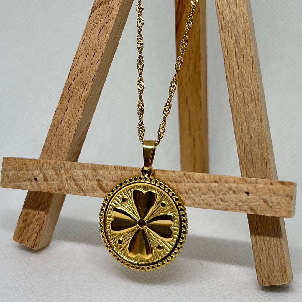 Intricate Gold Medallion Pendant Necklace