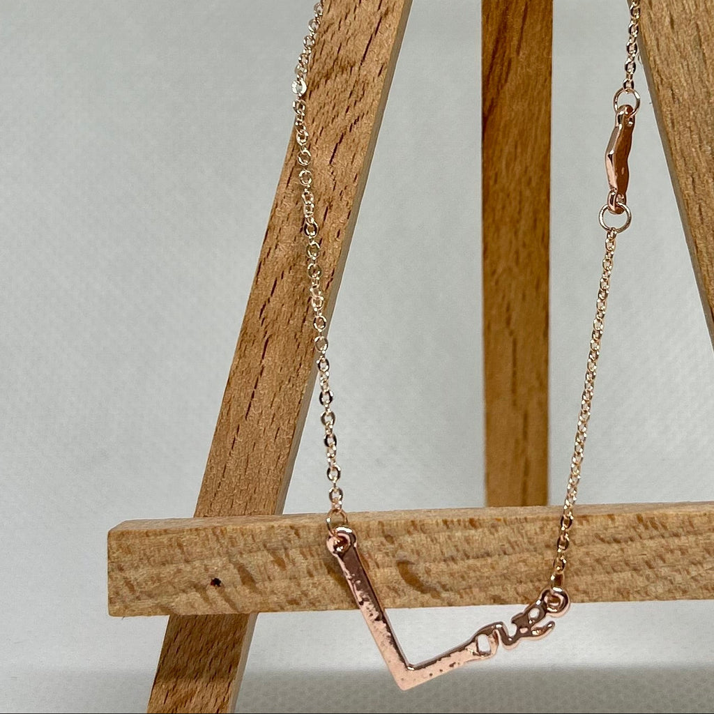 Dainty LOVE Inscribed Chevron Bar Necklace