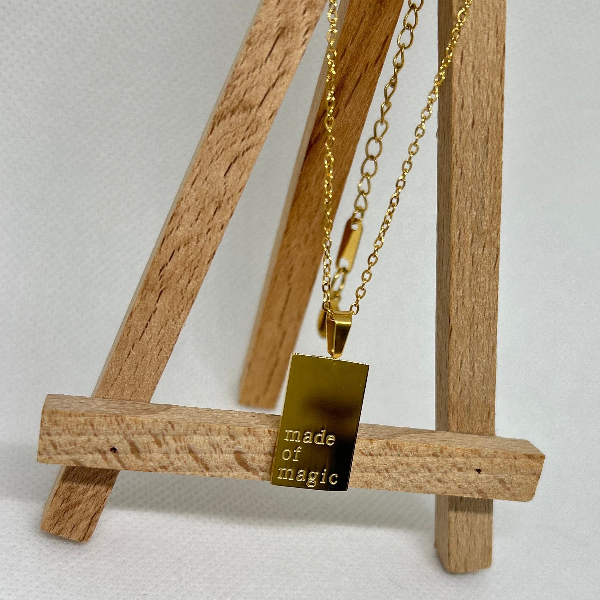 Motivational Gold Tone Pendant Necklace 'Made of Magic'