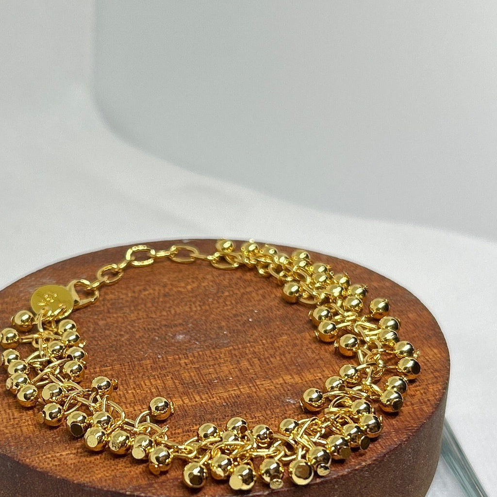 Gold Cluster Bead Fringe Statement Bracelet